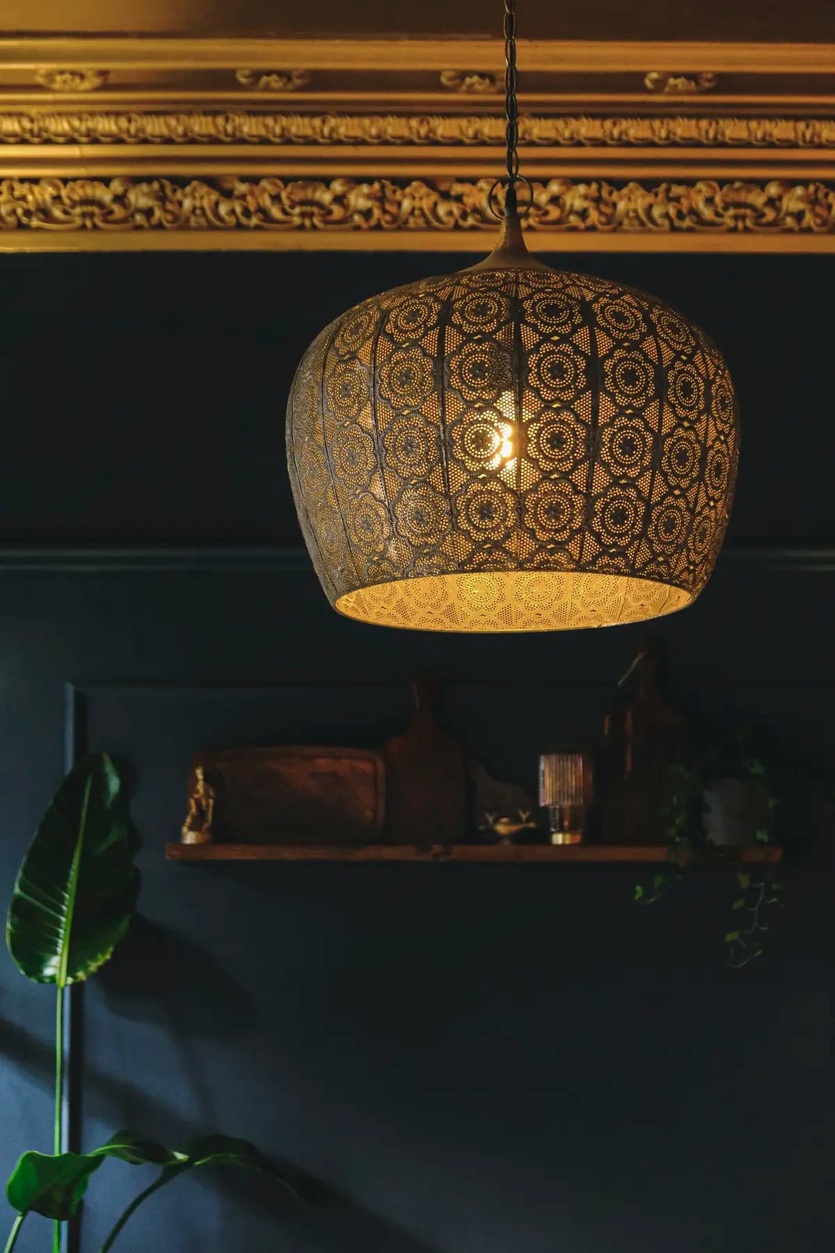 The warm, candlelit interior of Royâ restaurant in Glasgow